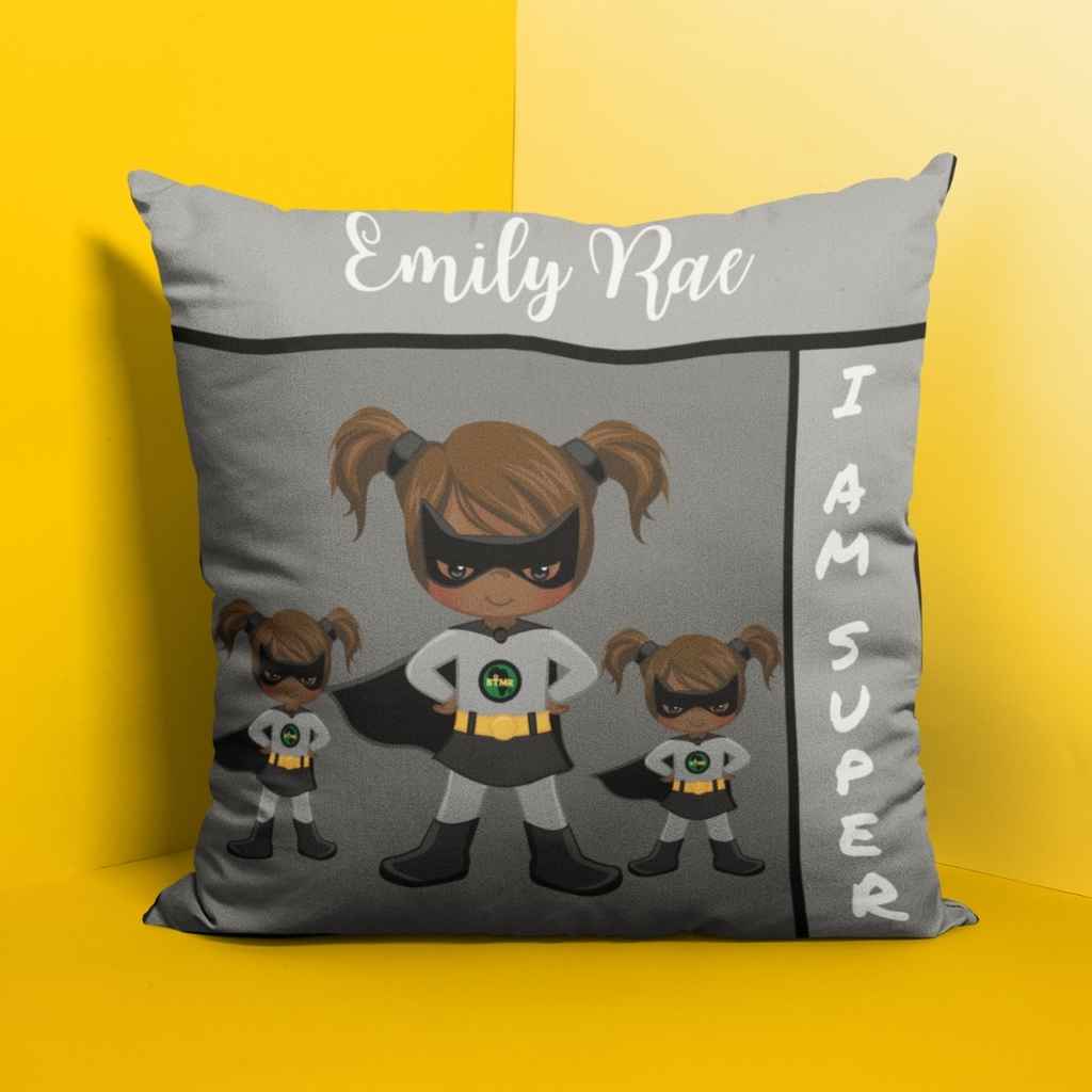 Personalised children's scatter cushion. Cushion has the child's name at the top and there are three superheroines. The cushion has the text, I am Super going along the right hand side.