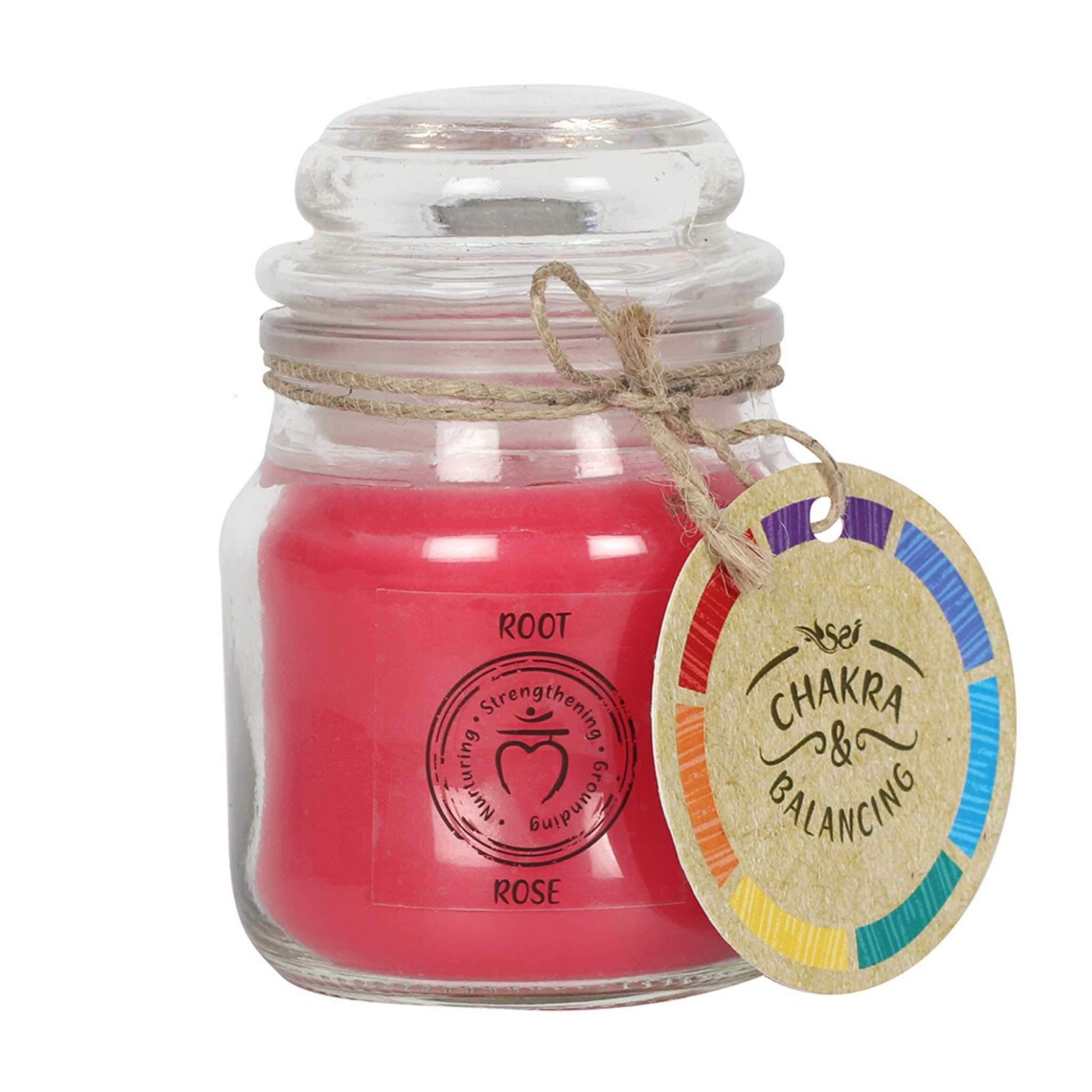 Balancing Chakra Candle in a min glass jar with stopper. Tied with a label that says Chakra Balancing. Candle is red with a label on the jar that says Root - Rose