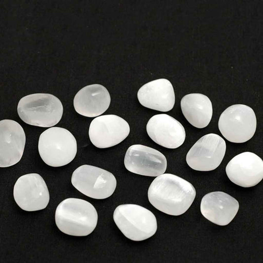 Polished White Selenite Tumblestones approx 15g each, varying sizes and shades. Translucent Selenite Tumblestones